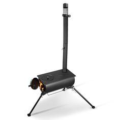 the portable stove is on top of a tripod with an open flame in it