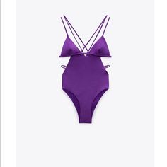 Swimsuit With Removable Cups, V-Neckline, And Double Cross-Back Straps. Cut Out Details At Waist. Purple V-neck Swimwear With Lined Body, Elegant Purple Swimwear For Summer, Purple Party Swimwear For Spring, Spring Party Bodysuit With Triangle Top, Purple Backless Swimwear For Party, Purple Backless Party Swimwear, Chic Purple Sleeveless Swimwear, Chic Purple Swimwear For Parties, Chic Zara Swimwear For Vacation