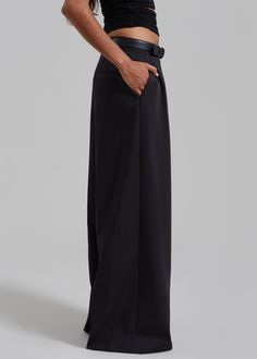 Color: Black Lightweight fluid fabric Relaxed fit Wide leg Pleated detailing Side seam pockets Illusion welt back pocket Hook and bar closure Zip fly Unlined 75% Polyester 25% Rayon Dry Clean By The Frankie Shop. Imported Elegant Wide Leg Bottoms For Semi-formal Occasions, Chic Black Semi-formal Pants, Tailored High-waist Wide Leg Pants With Pockets, Classic High-waist Bottoms With Pressed Crease, Classic High Waist Bottoms With Pressed Crease, Business Trousers With Side Pockets, Business Pants With Side Pockets, Modern Evening Trousers, Elegant Black Semi-formal Wide Leg Pants