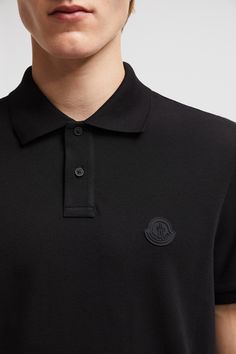 A timeless design that transcends seasons, this polo shirt is crafted from cotton piqué. The classic style is embellished with a Moncler logo patch on the chest. Luxury Polo Shirt With Ribbed Collar And Short Sleeves, Luxury Polo Shirt With Ribbed Collar, Luxury Short Sleeve Polo Shirt With Ribbed Collar, Designer Polo Shirt With Embroidered Logo, Luxury Short Sleeve Polo Shirt, Luxury Collared Polo Shirt For Formal Occasions, Designer Top With Embroidered Logo And Collared Neckline, Designer Tops With Embroidered Logo, Classic Collared Tops With Logo Detail