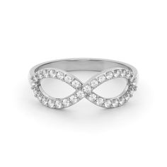 The pavé infinity ring is a piece you'll want to wear forever. This elegant design features the infinity symbol dotted with tiny pavé stones. Choose from crystals, lab-grown diamonds, or natural diamonds to customize this ring. Elegant Stackable Diamond Rings With Si Clarity, Elegant Diamond Ring With Si Clarity, Elegant Si Clarity Diamond Ring, Elegant Diamond Ring With Si Clarity And Round Cut, Elegant Sterling Silver Diamond Ring With Si Clarity, White Gold Infinity Promise Jewelry, Modern Twist Infinity Stackable Rings For Anniversary, Anniversary Infinity Stackable Rings, Classic Infinity Ring With Cubic Zirconia