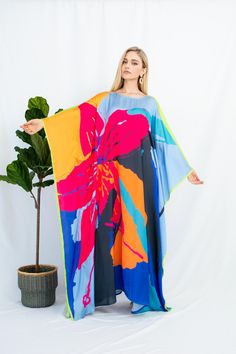 A full length kaftan plus size featured with abstract floral vibrant print  will bring the elegant vibe of forever spring and would be a perfection for holiday occasions or any event you attend. The fabric is blended silk with more than 80% silk so the care is more easier with washing and iron, in addition less wrinkles. It's totally smoothly flowy, soft and gentle touch. FEATURES - Pink, Blue and Vibrant Colors - Abstract floral arts - Personal Custom Made - Full Length Kaftan Half-Sleeves - Designer Silk Kaftan - Plus Size and Custom Length - Resort Wear, Beach Wear, Lounge Wear, Pool Cover Up Kaftan - Boat Neck -------------------------------- DETAIL  * The size can be adjusted to fit up to 5 XL. Bust/ Waist/ Hip up to 53 inches ( 106 inches full circumference)  * Length of the kaftan c Vibrant Print Kaftan With Kimono Sleeves For Beach, Vibrant Print Maxi Dress For Beach, Vibrant Floral Print Kaftan For Vacation, Flowy Multicolor Printed Kaftan, Vibrant Printed Multicolor Kaftan, Oversized Floral Print Maxi Dress, Vibrant Multicolor Floral Print Kaftan, Multicolor Tropical Kaftan With Kimono Sleeves, Vibrant Maxi Length Kaftan For Spring