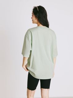 Details: Refreshing bean green T-shirt Loose oversize version The bread pattern on the chest ins style, new and cute Classic round neck design with ribbed trim Materials & Care: Cotton 100% Hand wash | Dry clean Do not bleach Size & Fit: Model is 5'7", Bust 32, Waist 24, Hips 35, wearing a size S Item #: LM2TE34 Green Oversized Short Sleeve Tops, Oversized Green Short Sleeve Top, Casual Soft-washed Green Tops, Green Relaxed Fit T-shirt, Green Relaxed Fit Comfortable T-shirt, Comfortable Oversized Top With Ribbed Neckline, Green Soft-washed Crew Neck Top, Green Drop Shoulder Tops For Streetwear, Green Drop Shoulder Summer Tops