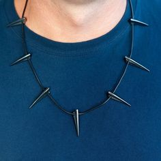 Can't get enough of Black Panther? BTW, do you know that people of Wakanda prefer a cat-alogue to e-shopping? If you plan to become Wakanda King T'Challa for Halloween or your next dress up craze ... This Authentic Marvel Claw Pendant is right up your warrior alley, my hybrid friend Spring your neck to life with the ultimate superhero-action jewelry. A one-of-a-kind claw pendant necklace, comfortable and visually packed with sharp boldness. We swear by the original T'Challa's metal claw design, Wakanda Necklace, Black Panther Necklace, King T Challa, Black Panther Comic, Panther Necklace, Panther Costume, Black Panther Costume, Stainless Steel Collar, Marvel Costumes