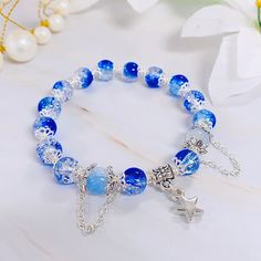 This cute bracelet is casual and suitable for any occasions. It's also a great gift idea for family, friends, or children. Bracelet Star, Cute Bracelet, Glass Bead Bracelet, Glass Beaded Bracelets, Cute Bracelets, Star Charms, Bead Bracelet, Glass Bead, Family Friends