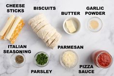 the ingredients to make an appetizer laid out on a marble surface