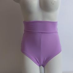 Empire High Waist Shorts From Bad Kitty In Lavender. Matches The Lavender Mesh Padded Bra, Zipper Front Padded Bra And Thick Strap Bra Perfectly. Fitted Purple Hip-length Bottoms, Purple Stretch Bottoms Short Length, Fitted High Waist Purple Shorts, Fitted High-waisted Shorts For Beach, Fitted High-waisted Shorts For The Beach, Fitted Purple Bottoms With Elastic Waistband, Trendy High Waist Swimwear With Built-in Shorts, Trendy High-waist Swimwear With Built-in Shorts, Stretch Purple Bottoms For Summer