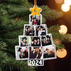 a christmas tree ornament with photos hanging from it