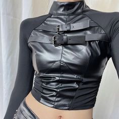 𝔇𝔢𝔱𝔞𝔦𝔩𝔰: Style: Cyberpunk, Darkwear, Techwear, Streetwear Material: Leather, spandex High-quality punk style leather top with metal buckle Super stretchable, it fits your body perfectly without making you feel rigid Enjoy free shipping with a purchase of over 80$ SIZE LENGTH CHEST SLEEVE WAISTS 15 in 29-33 in 26 in 24 inM 16 in 31-35 in 26 in 25 inL 16 in 32-36 in 27 in 27 inItem measured by hands may have 1-2 in differences.SIZE LENGTH CHEST SLEEVE WAISTS 39 cm 74-84 cm 66 cm 60 cmM 40 c Style Cyberpunk, Techwear Streetwear, Buckle Top, Contemporary Outfits, Punk Style, Leather Outfit, Leather Mini Skirts, Leather Buckle, Character Outfits