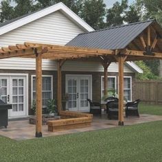 a backyard with a grill and covered patio