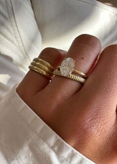 A modern ring—the Annabelle makes the perfect wedding band, promise ring, or everyday piece. 14k solid gold—always Average weight: 2.8g Band width: 2.7mm Height off of finger: 1.9mm Custom sizing is available. Custom sized pieces are final sale. This piece cannot be resized. 14k White Gold Promise Ring With Round Band, Classic Thick Band With Diamond Cut, Minimalist Thick Band Diamond Cut Jewelry, Timeless Stackable Diamond Ring, 14k Gold Stackable Solitaire Rings, Everyday White Gold Rings With Single Diamond, Minimalist 14k Gold Band With Vvs Clarity, Minimalist Thick Band Diamond Anniversary Ring, Classic Everyday Emerald Cut Diamond Ring