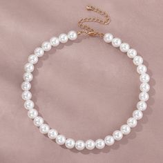 Be adorned in timeless sophistication with this exquisite pearl chain necklace. Carefully crafted from pearls, this elegant piece will be a timeless addition to your accessory collection. The subtle and classic luster of this fine necklace is perfect for any special occasion, making it the ideal accessory for any look. Order Now for FREE Shipping Specifications Style: Classic Shape/pattern: Round Pearl Type: Simulated-pearl Pearl Shape: Perfectly Round Occasion: Party Necklace Type: Chokers Neck Glamour Jewelry, Pearl Chain Necklace, Pearl Necklace Wedding, Party Necklace, Neck Jewellery, Pearl Choker Necklace, Necklace Fashion, Chain Choker Necklace, Pearl Choker