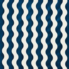 a blue and white fabric with wavy lines