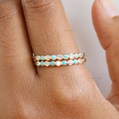 14K Gold Ring, Studded Ring, Dainty Wedding Ring, Gemstone Engagement Ring, Turquoise Ring For Her, Emerald Ring, Half Eternity Ring, Engagement Band Ring Product info: 14k solid gold Diamond: SI-I Clarity Diamond: 0.30 ct, Natural Turquoise: 0.27 ct, Natural Arizona *Price is for single ring Ring Size 7 Item will be resized and shipped within 10 days. ITEM Will BE SHIPPED : India Speed Post To get the item in 4-5 days, we can also ship it thru DHL express, please contact us before. Please selec Fine Jewelry Diamond Turquoise Ring For Anniversary, Turquoise Round Band Ring For Anniversary, Gold Turquoise Wedding Ring, Gold Diamond Turquoise Ring For Anniversary, Fine Jewelry 14k Gold Turquoise Wedding Ring, 14k Gold Turquoise Ring For Wedding, Fine Jewelry 14k Gold Turquoise Ring For Wedding, Turquoise Bezel Setting Wedding Jewelry, Turquoise Bezel-set Wedding Jewelry