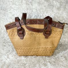 Fossil Woven Tan Straw Brown Leather Trim Tote Shoulder Bag - Nwot This Bag Still Has The Stuffing From Being Brand New. Clean Inside! Sadly, There Are Flaws From The Bag Being Bumped Around In Storage. See Pictures For Details. Height: 12 Inches Length: 12 Inches (Approximately) Drop Length: 9 Inches Elegant Brown Straw Bag For Everyday, Brown Shoulder Bag With Zipper For Vacation, Brown Straw Bag With Gold-tone Hardware For Daily Use, Brown Straw Bag With Gold-tone Hardware For Shopping, Brown Straw Shopping Bag With Gold-tone Hardware, Vintage Brown Satchel With Braided Handles, Vacation Leather Shoulder Bag With Gold-tone Hardware, Brown Straw Bag With Double Handle And Gold-tone Hardware, Leather Straw Bag With Gold-tone Hardware For Daily Use