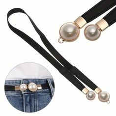 two pearls are attached to the back of a pair of black and gold suspenders