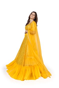 For mesmerizing looks, you'll be head over heels for this Yellow Georgette lehenga choli set. Crafted with multi sequins embroidery work, this set is designed with a 4-meter flair, soft net dupatta and regular sleeve blouse with round neck. Floor length lehenga comes with a soft net dupatta, and customizations are available. Be ready to dazzle in this gorgeous ensemble! (Oh, and don't forget to dry clean!) No of Set - 3-piece set Color- Yellow Lehenga Choli Fabric - Georgette Stitch Type - Semi- Semi-stitched Georgette Sets With Sequins, Navratri Semi-stitched Lehenga With Sequins, Navratri Sequined Georgette Lehenga, Navratri Georgette Lehenga With Sequins, Diwali Semi-stitched Sequined Lehenga, Party Wear Sequined Lehenga For Diwali, Diwali Party Wear Lehenga With Sequins, Unstitched Sequined Georgette Lehenga, Unstitched Georgette Lehenga With Sequins