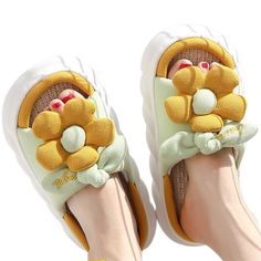 Teddy Flower Toe Slippers ﻿are the ideal pair of Slippers for everyday use. It is made with ultra lightweight and soft cushy materials, your feet will remain comfortable throughout the day with these on. Each pair comes with a lovely flower that sits on top of the strap. It can be used outdoor as well. FEATURES: Style Concise Season Summer/Spring Sole Flat Vamp material EVA Size US ( 5.5 - 12) COMFORTABLE MATERIAL: The Flower Open Toe Slippers are made of high-density material. These are light, Comfortable Eva Slippers With Round Toe, Soft Slip-on Summer Slippers, Comfortable Green Synthetic Slippers, Soft Synthetic Slippers For Summer, Synthetic Round Toe Slippers For Spring, Comfortable Platform Slippers With Cushioned Footbed For Spring, Soft Synthetic Summer Slippers, Non-slip Synthetic Platform Slippers, Comfortable Cushioned Platform Slippers For Spring