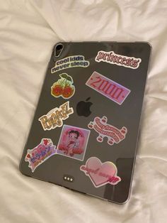 an ipad case with stickers on it