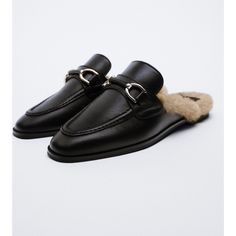 Flat Open Back Moccasins With Metal Buckle Detail, Lined Interior Workwear Fall Buckle Closure Mules, Workwear Buckle Closure Fall Mules, Workwear Buckle Closure Mules For Fall, Fall Workwear Mules With Buckle Closure, Elegant Formal Winter Loafers, Winter Formal Leather Loafers, Formal Leather Loafers For Winter, Elegant Flat Mules For Fall, Flat Mules For Office In Fall