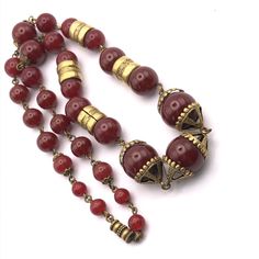 "Neiger Brothers Czech Art Deco antique chunky Carnelian brown glass beads. Fabulous necklace, these beads are larger than normal size you get in Neiger necklaces, The centre beads with bead caps are 2.2 cm wide. The next set of 2 beads with the patterned spacer = 2.8cm. The bead caps are very pretty, have detailed pattern to them and are open work and are in the shape of a circus tent.  The necklace is linked together with brass patinated findings. The total length of the beads is 19.5\" inches Excellent condition - there are no chips or cracks.  Please note I return any overpaid postage costs to you, it is difficult to judge exact costs at the time of listing." Vintage Jewelry With Large Round Beads, Vintage Amber Jewelry With Large Beads, Vintage Large Beads For Jewelry Making, Large Vintage Beads For Jewelry Making, Vintage Czech Glass Necklaces With Polished Beads, Vintage Faceted Beads Gems And Cabochons As A Gift, Vintage Necklace With Polished Beads, Vintage Faceted Beads For Gifts, Vintage Czech Glass Polished Beads Necklace