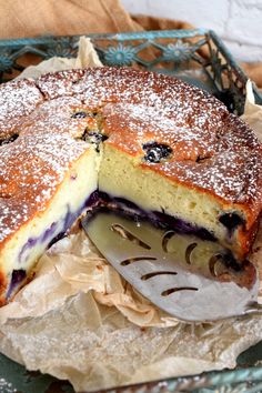 a blueberry cheesecake is cut in half