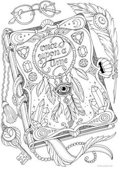 a coloring book with an eye and feathers on the cover, surrounded by other items