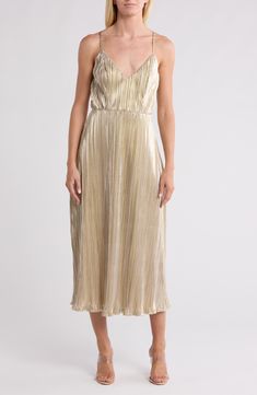 Make an elegant appearance in this metallic plissé midi dress tethered by slim criss-cross straps. Slips on over head V-neck Adjustable straps Lined 95% polyester, 5% spandex Hand wash, dry flat Imported Gold Midi Dress For Summer Formal Events, Metallic Midi Cocktail Dress, Glamorous Metallic Midi Dress, Gold V-neck Midi Dress For Formal Occasions, Gold V-neck Midi Dress For Spring, Formal Gold V-neck Midi Dress, Gold Midi Dress For Gala, Metallic Midi-length Dress For Gala, Metallic Midi Dress For Gala