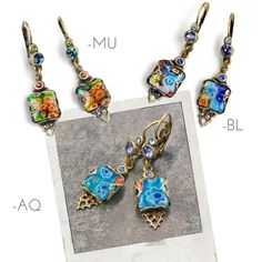 "These retro boho earrings are inspired by the geometric style of mid-century 1960s and the color fusion of today. Millefiori art glass tiles are set in open back frames, allowing light to fill the art glass. Multi color Swarovski crystal dots the frame and post. Burnished bronze finish. Size: 1.75\" long. Made in our Los Angeles studios. Sweet Romance Jewelry, USA. Millefiori means thousand flowers. Bundles of tiny glass filament rods, sliced and fired, meld their brilliant colors and floral pa Handmade Rectangular Vintage Earrings, Handmade Vintage Rectangular Earrings, Vintage Rectangular Earrings As Gift, Vintage Rectangular Earrings For Gift, Vintage Rectangular Earrings For Gifts, Bohemian Multicolor Rectangular Earrings, Multicolor Retro Jewelry For Vintage Collection, Nickel-free Retro Dangle Earrings, Multicolor Vintage Earrings As Gift