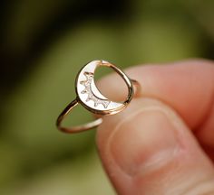 **PLEASE NOTE: This item is MADE TO ORDER. Current production times are listed below (Ready to ship in---) and in the announcement section of my shop's homepage. **Artist crafted. Original design made in Richmond, VA.** Dainty crescent moon circle ring in your choice of solid 10k gold or sterling silver. Polished finish with brushed satin accents. **If unsure of your ring size, you can be easily measured at any local jewelry store. In the event that you order the wrong size, resizing (when possi Celestial Open Ring With Moon Phase Detail, Adjustable Moon Charm Ring, Celestial Moon Phase Open Ring Jewelry, Adjustable Sun And Moon Design Jewelry For Promise Ring, Minimalist Everyday Jewelry With Sun And Moon Design, Celestial Moon Phase Open Ring, Minimalist Adjustable Sun And Moon Jewelry, Everyday Sun And Moon Design Round Jewelry, 14k Gold Crescent Jewelry For Promise Ring