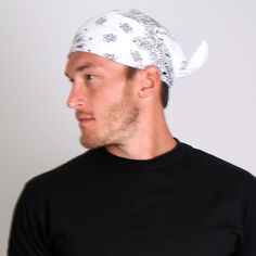 • Classic Style Bandana • Hot Leathers Original Design • 21" X 21" Measurement Our signature Classic White Paisley Bandana features an original black on white design with a repetitive pattern, allowing for wear in multiple ways. Wear this ban Casual Cotton Patterned Bandana, Casual Cotton Bandana With Pattern, Classic Cotton Bandana With Bandana Print, Casual Paisley Print Patterned Bandana, Casual Patterned Paisley Print Bandana, White Casual Bandana, White Adjustable Casual Bandana, Adjustable White Bandana For Summer, Adjustable White Summer Bandana