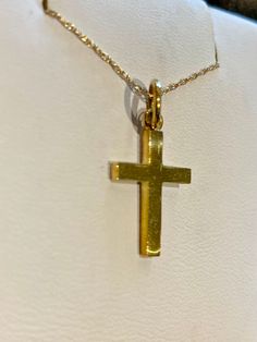 This cross, made by BPJ, is solid 14k yellow gold and measures 17mm in length. Chain not included. Yellow Gold Polished Cross Necklace Pendant, Yellow Gold Cross Pendant Stamped 14k, Classic 14k Gold Crucifix Jewelry And Charms, Yellow Gold 14k Stamped Cross Pendant, Classic 14k Gold Crucifix Jewelry, Formal 14k Gold Cross Jewelry And Charms, 14k White Gold Crucifix Cross Necklace, White Gold 14k Crucifix Cross Necklace, 14k White Gold Cross Pendant Necklace