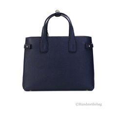 Style: Burberry Banner Medium Regency Blue Tote Crossbody Bag Material: Grainy Leather Features: Adjustable/Detachable Crossbody Strap, Inner Zip and Slip Pockets, Center Zip Compartment Divider, Protective Bottom Studs Measures: 13.25" L x 9.5" H x 6" D Blue Tote, Chain Shoulder Bag, 6 D, Burberry Bag, Leather Tote Bag, Crossbody Strap, Blue Leather, Cross Body Handbags, Leather Tote