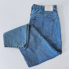 "High-waisted straight fit cropped ankle jeans with a booty boosting fit. Made by Everlane 100% Cotton Size: 31 Regular Measurements are taken lying flat. Waist: 17\" Hip: 21.5\" Rise: 12\" Inseam: 28\": Length: 39.5\" Please note: All sales are final and sold \"as is\".  You are purchasing a preloved item.  You will receive the exact piece that is pictured.  I will always try to mention all flaws as I see them." Dark Wash Straight Leg Mom Fit Cropped Jeans, Dark Wash Mom Fit Straight Leg Cropped Jeans, Dark Wash Mom Fit Cropped Jeans, Dark Wash Cropped Mom Jeans, Mom Fit Dark Wash Cropped Jeans With Frayed Hem, Medium Wash Cropped Leg Mom Fit Bottoms, Medium Wash Mom Fit Cropped Bottoms, Everyday Medium Wash Cropped Jeans, Everyday Mom Fit Cropped Jeans With Tapered Leg