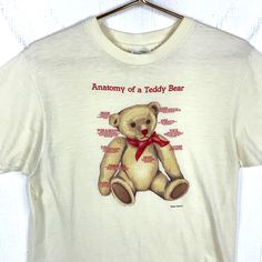 Vintage Anatomy Of A Teddy Bear 1982 T-Shirt Large Beige Made Usa 80s Size/Measurements (Based in inches) Size - Large Pit to pit - 19.5" Length - 27" Condition / Details Light stains found on front and on back Combined Shipping: We provide combined shipping, please contact us for a quote Teddy Bear Shirt, Vintage Anatomy, Clothes Graphic, Teddy Boy, Teddy Bear Clothes, Teddy Boys, Fur Clothing, A Teddy Bear, Bear Ears