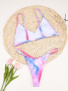 This Brazilian style tie-dyed bikini set will let your grace take the front seat in summer. Made from durable polyester, heat-resistant spandex, and abrasion-resistant nylon, this low-waisted, wire-free bikini set offers the utmost comfort all-day long while giving that sexy feel. This padded bikini set will make every woman's sunbath memorable. SpecificationsBrand Name: GeraldBlackOrigin: CN(Origin)Pattern Type: PrintWaist: Low WaistItem Type: Bikinis SetSupport Type: Wire FreeModel Number: C31 Tie-dye Swimwear For Summer Pool, Summer Tie-dye Swimwear For Pool, Summer Tie Dye Swimwear For Pool, Tie Dye Triangle Top Swimwear, Tie Dye Swimwear For Summer Pool Days, Summer Tie Dye Triangle Top Swimwear, Tie Dye Triangle Top Swimwear For Summer, Tie Dye Swimwear For Pool In Summer, Fitted Tie Dye Swimwear For The Beach