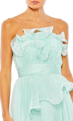 Long strapless pleated a-line formal dress with ruffle accent and empire waist.