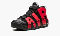 The Nike Air More Uptempo “Split” is a colorway that celebrates the career of Scottie Pippen, the Basketball Hall of Famer who memorably wore the basketball shoe with the Chicago Bulls in 1996.  The “Split” features a mismatched design that salutes the two basketball teams Pippen played for in ‘96 while wearing the Air More Uptempo: the Bulls and the Dream Team 2 that competed at the ‘96 Summer Olympics in Atlanta, GA.  The black synthetic nubuck upper is contrasted with red “AIR” branding on th Dream Team 2, Blue Air, Scottie Pippen, Nike Basketball, Summer Olympics, Carolina Blue, Sketchers Sneakers, Basketball Teams, Basketball Shoes