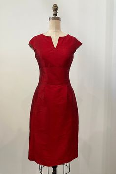 "Retro-inspired cap-sleeve sheath dress with wide inset waistband.   -Stylish split jewel-neckline and full back coverage with center back zipper -Below-the-knee length skirt (26\" from waist) has double pleats and in-seam pockets in front -back seams extend into two kick pleats -3 1/2\" wide inset waistband -silk shantung with poly china silk lining -dry clean only Shown in a festive Ruby Red with pale blush pink lining. We have a size X-small in-stock available for immediate delivery.  Additio Shantung Dress, Floral Ball Gown, Formal Skirt, Ball Gown Skirt, Kick Pleat, Jewel Neckline, Bride Dresses, Knee Length Skirt, Color Swatches