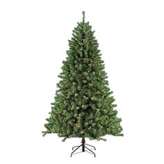 a small christmas tree with lights on it's branches and a black stand in front of a white background