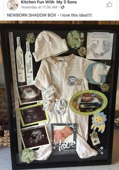 a baby's clothes and other items are displayed in a shadow box