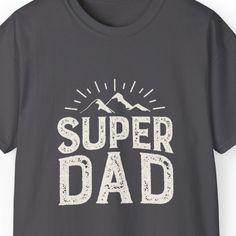 Show your appreciation for the super dad in your life with our 'Super Dad Men's Tee.' This stylish and comfortable Father's Day T-shirt features a striking mountain landscape background, making it the perfect gift for adventurous dads. Whether he's conquering mountains or simply being the superhero dad at home, this tee celebrates his strength and love. Available in various sizes, it's a thoughtful and meaningful gift for Father's Day or any occasion. Order yours today and let your super dad wea Mountain Tee, Landscape Background, Super Dad, Father's Day T Shirts, Mountain Landscape, Gifts For Father, Meaningful Gifts, Mens Tees, Fathers Day Gifts