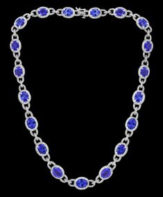 For Sale on 1stdibs - This extraordinary Necklace is consist of 19 Fine oval Tanzanite weighing approximately 47 Carats. There are total of approximately 8.5 carats of shimmering Luxury Oval Tanzanite Necklaces, Luxury Tanzanite Necklace With Brilliant Cut, Formal Hallmarked Oval Diamond Necklace, Luxury Oval Link Diamond Necklace For Formal Occasions, White Gold Tanzanite Oval Necklaces, Classic Oval Tanzanite Necklace, Luxury Oval Tanzanite Jewelry, Classic Oval Tanzanite Necklaces, Luxury Oval Necklace With Pave Setting