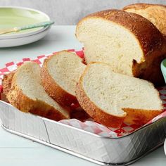 a loaf of bread sitting on top of a tin