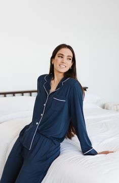 These breathable and stretchy pajamas are the perfect go-to on chilly nights when you just want to snuggle. Top has notched collar; long sleeves 95% viscose, 5% spandex Machine wash, tumble dry Imported Cozy Long Sleeve Sleep Sets, Cozy Long Sleeve Loungewear Sets, Cozy Long Sleeve Lounging Sets, Long Sleeve Lounging Sets For Fall, Fall Long Sleeve Lounging Sleepwear, Blue Long Sleeve Sleepwear For Relaxation, Blue Long Sleeve Sets For Relaxation, Long Sleeve Pajama Sets For Fall, Relaxed Fit Long Sleeve Sleepwear For Pajama Party