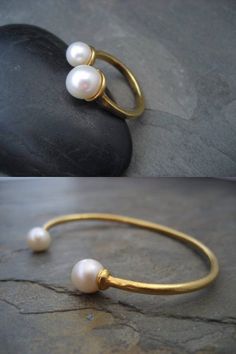 This item is made to order please allow 5 to 8 business days for your order to ship. This ring was hand carved out of wax and cast in solid .925 sterling silver, followed by a 18k gold plating. On top are 2 genuine cultured pearls that are nestled in a cup. The larger pearl measures approx. 8mm the smaller one 6.5mm. Please note that size and color may slightly vary, since these are natural pearls. Available in sterling silver and 18k gold plating over sterling silver. Please choose from the dro Adjustable Gold Pearl Ring For Formal Occasions, Formal Pearl Charm Brass Jewelry, Unique Pearl Jewelry For Anniversary, Anniversary Brass Jewelry With Pearl Drop, Elegant Hand Forged Open Ring Jewelry, Heirloom Style Yellow Gold Pearl Jewelry, Heirloom Yellow Gold Pearl Jewelry, Minimalist Gold Pearl Ring In Sterling Silver, Elegant Adjustable Yellow Gold Pearl Ring