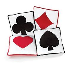 four playing cards pillows on top of each other