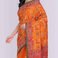 Step into a world of beautiful sarees with this stunning Transitional Gharchola in Orange and Red. Made from gaji silk, it features a combination of resham and zardosi embroidery, with beautiful motifs in a traditional and transitional pattern.It's the perfect way to add a touch of elegance to any outfit, whether you're attending a special event or just want to add a little something extra to your everyday look. So why not treat yourself to this unique and gorgeous gharchola today? Fall and Pico Embroidered Banarasi Silk Choli For Navratri, Transitional Pre-draped Saree With Cutdana For Traditional Ceremonies, Semi-stitched Traditional Wear With Zari Work For Navratri, Traditional Red Pre-draped Embroidered Saree, Traditional Red Embroidered Pre-draped Saree, Transitional Embroidered Banarasi Silk Choli, Embroidered Banarasi Silk Choli For Transitional Season, Festival Paithani Silk Pre-draped Saree With Zari Work, Festival Paithani Silk Pre-draped Saree With Cutdana