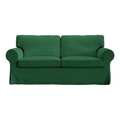 a green couch on a white background