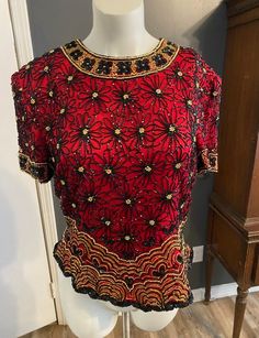 "Great condition. May have some loose beads but overall great size L Chest 19.5\" Flat" Red Embellished Evening Blouse, Red Sequin Evening Blouse, Red Sequined Blouse For Evening, Red Embellished Blouse For Evening, Festive Embellished Red Tops, Papell Boutique, Fire Dancer, Pastel Beads, Vintage Hawaiian Shirts